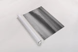 Curling Lip BW by Nathan Larson. shown as a rolled paper print. Available as archival giclee rolled canvas, fine art paper, or poster print. SKU 73678i.