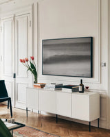 Curling Lip BW by Nathan Larson. shown as a framed stretched canvas in a living room above a console. Available as a archival giclee rolled canvas, fine art paper, or poster print. SKU 73678i.