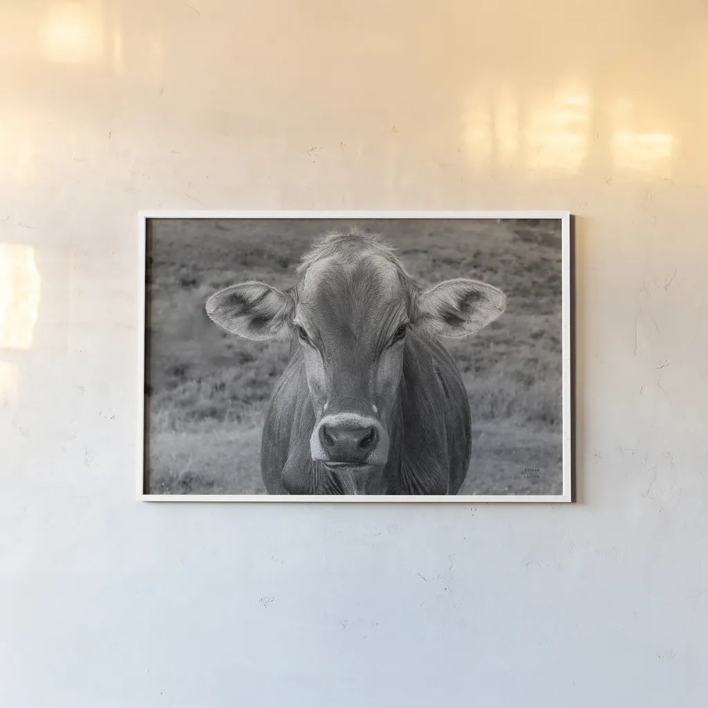 Dairy Barn BW by Nathan Larson. shown as a paper print in a white frame. Available as a archival giclee rolled canvas, fine art paper, or poster print. SKU 82815i.