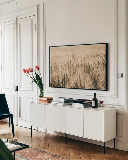 Dakota Wheat Fields by Nathan Larson. shown as a framed stretched canvas in a living room above a console. Available as a archival giclee rolled canvas, fine art paper, or poster print. SKU 71167i.
