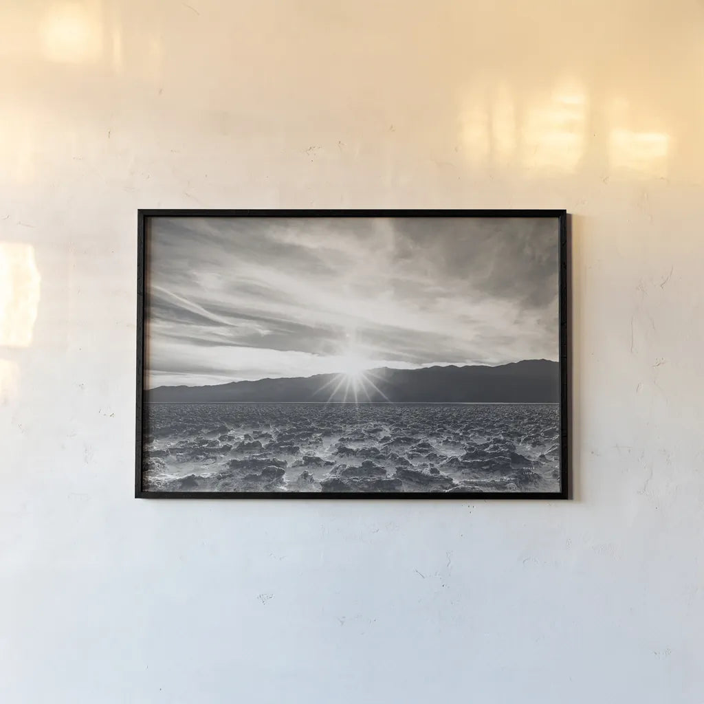 Death Valley Sunset by Nathan Larson. shown as a paper print in a black flame. Available as a archival giclee rolled canvas, fine art paper, or poster print. SKU 96622i.