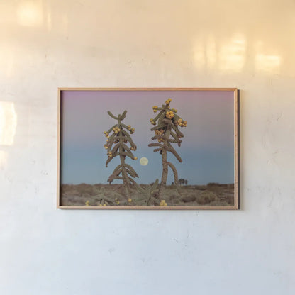 Desert Moonrise by Nathan Larson. shown as a paper print in a natural frame. Available as a archival giclee rolled canvas, fine art paper, or poster print. SKU 76443i.
