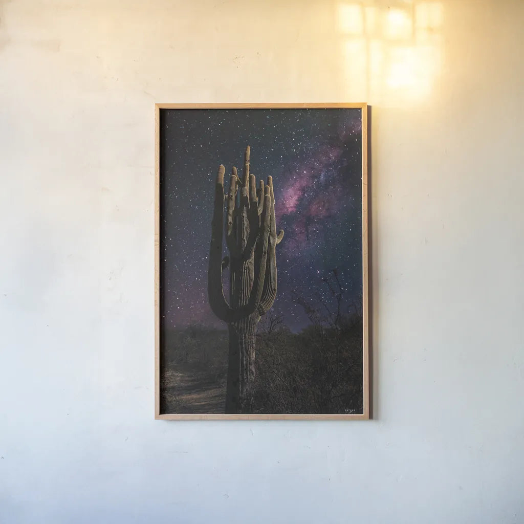 Desert Nights by Nathan Larson. shown as a paper print in a natural frame. Available as a archival giclee rolled canvas, fine art paper, or poster print. SKU 76428h.