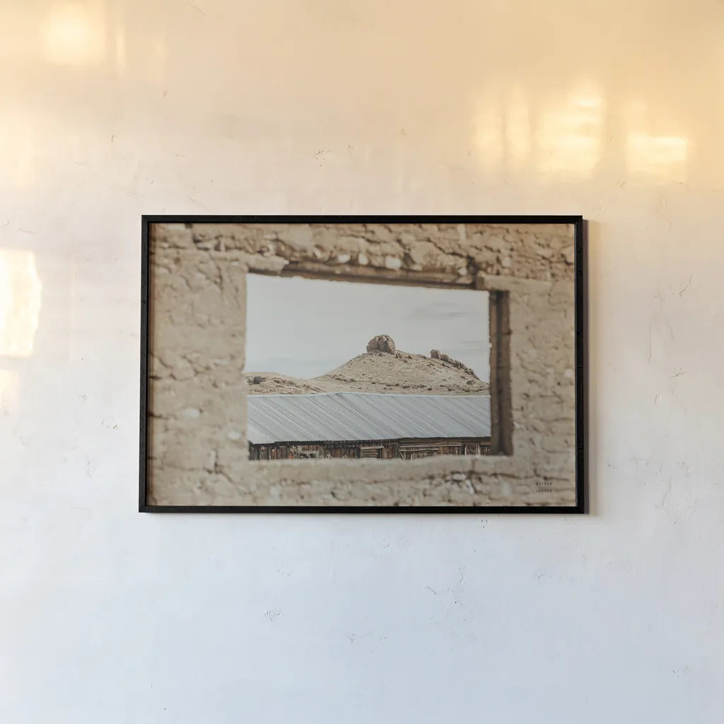 Desert Window by Nathan Larson. shown as a paper print in a black flame. Available as a archival giclee rolled canvas, fine art paper, or poster print. SKU 81820i.
