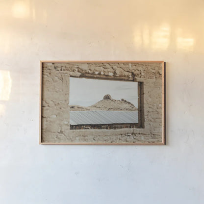 Desert Window by Nathan Larson. shown as a paper print in a natural frame. Available as a archival giclee rolled canvas, fine art paper, or poster print. SKU 81820i.