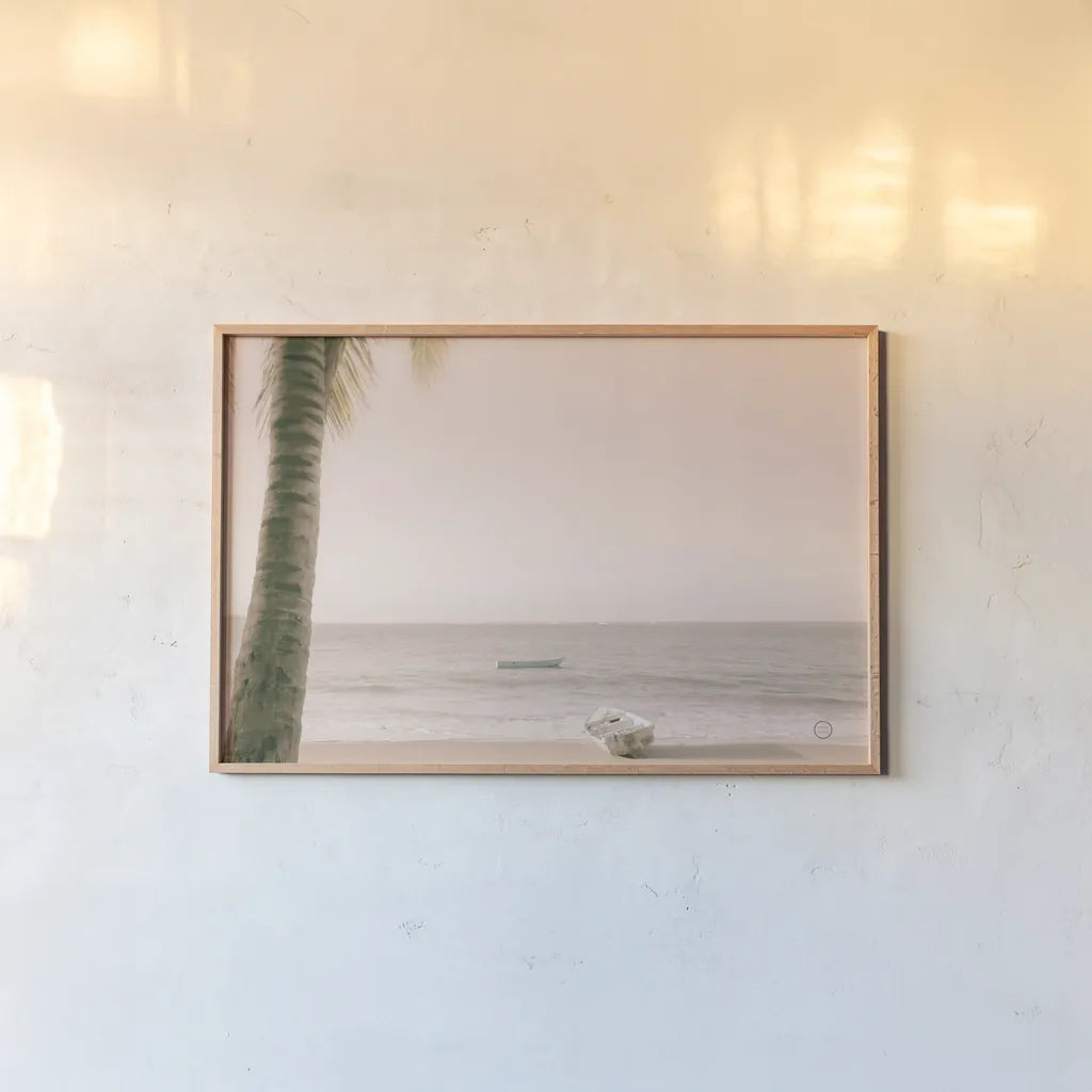 Dominican Fishing Boats by Nathan Larson. shown as a paper print in a natural frame. Available as a archival giclee rolled canvas, fine art paper, or poster print. SKU 73714i.