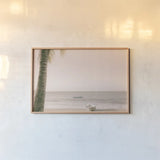 Dominican Fishing Boats by Nathan Larson. shown as a paper print in a natural frame. Available as a archival giclee rolled canvas, fine art paper, or poster print. SKU 73714i.