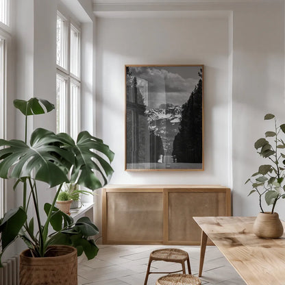 Driving into the Tetons by Nathan Larson. shown as a print in a natural wood frame in a dining room. Available as a archival giclee rolled canvas, fine art paper, or poster print. SKU 92539h.