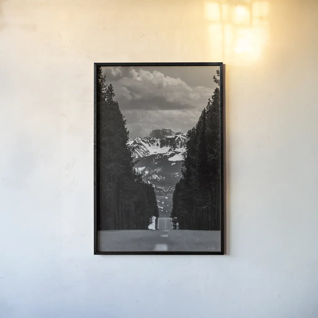 Driving into the Tetons by Nathan Larson. shown as a paper print in a black flame. Available as a archival giclee rolled canvas, fine art paper, or poster print. SKU 92539h.