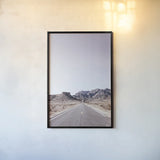 Dusty Desert Dreams Road by Nathan Larson. shown as a paper print in a black flame. Available as a archival giclee rolled canvas, fine art paper, or poster print. SKU 72031h.
