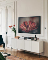 Elevation Bloom by Nathan Larson. shown as a framed stretched canvas in a living room above a console. Available as a archival giclee rolled canvas, fine art paper, or poster print. SKU 88547i.