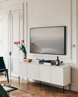 Endless Pacific by Nathan Larson. shown as a framed stretched canvas in a living room above a console. Available as a archival giclee rolled canvas, fine art paper, or poster print. SKU 97439i.