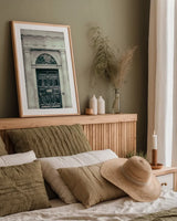 Faded Dublin Door Black by Nathan Larson. shown as a paper print in a natural frame. Available as a archival giclee rolled canvas, fine art paper, or poster print. SKU 104276h.