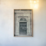 Faded Dublin Door Black by Nathan Larson. shown as a paper print in a natural frame. Available as a archival giclee rolled canvas, fine art paper, or poster print. SKU 104276h.