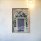 Faded Dublin Door Blue by Nathan Larson. shown as a paper print in a natural frame. Available as a archival giclee rolled canvas, fine art paper, or poster print. SKU 104274h.