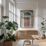 Faded Dublin Door Coral by Nathan Larson. shown as a print in a natural wood frame in a dining room. Available as a archival giclee rolled canvas, fine art paper, or poster print. SKU 104278h.