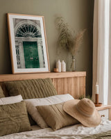 Faded Dublin Door Green by Nathan Larson. shown as a paper print in a natural frame. Available as a archival giclee rolled canvas, fine art paper, or poster print. SKU 104275h.