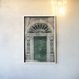 Faded Dublin Door Green by Nathan Larson. shown as a paper print in a white frame. Available as a archival giclee rolled canvas, fine art paper, or poster print. SKU 104275h.