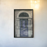 Faded Dublin Door Indigo by Nathan Larson. shown as a paper print in a black flame. Available as a archival giclee rolled canvas, fine art paper, or poster print. SKU 104272h.