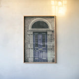 Faded Dublin Door Indigo by Nathan Larson. shown as a paper print in a natural frame. Available as a archival giclee rolled canvas, fine art paper, or poster print. SKU 104272h.