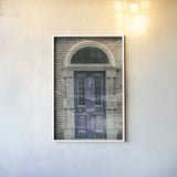 Faded Dublin Door Indigo by Nathan Larson. shown as a paper print in a white frame. Available as a archival giclee rolled canvas, fine art paper, or poster print. SKU 104272h.