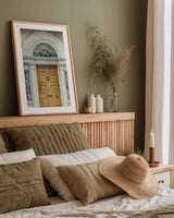 Faded Dublin Door Yellow by Nathan Larson. shown as a paper print in a natural frame. Available as a archival giclee rolled canvas, fine art paper, or poster print. SKU 104273h.