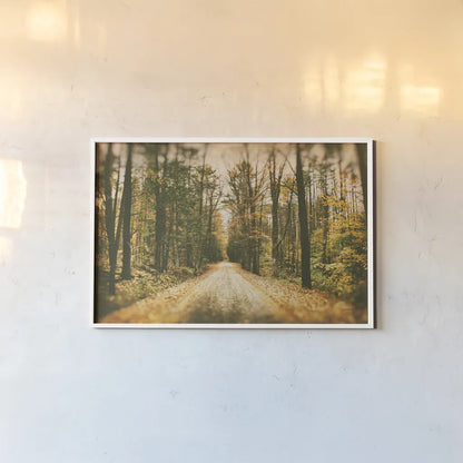 Faded Road by Nathan Larson. shown as a paper print in a white frame. Available as a archival giclee rolled canvas, fine art paper, or poster print. SKU 93987i.
