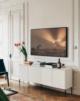 Faded Sunset by Nathan Larson. shown as a framed stretched canvas in a living room above a console. Available as a archival giclee rolled canvas, fine art paper, or poster print. SKU 87943i.
