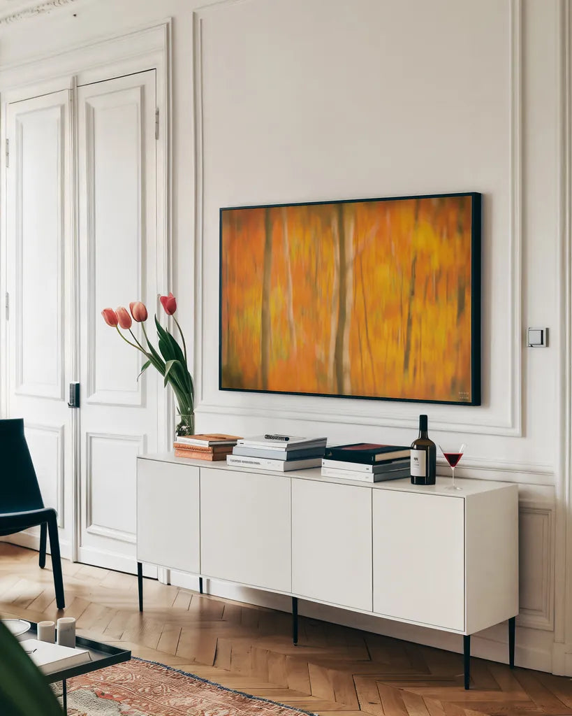 Fall in Motion by Nathan Larson. shown as a framed stretched canvas in a living room above a console. Available as a archival giclee rolled canvas, fine art paper, or poster print. SKU 101670i.