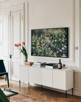 Field Friends Fade by Nathan Larson. shown as a framed stretched canvas in a living room above a console. Available as a archival giclee rolled canvas, fine art paper, or poster print. SKU 71624i.