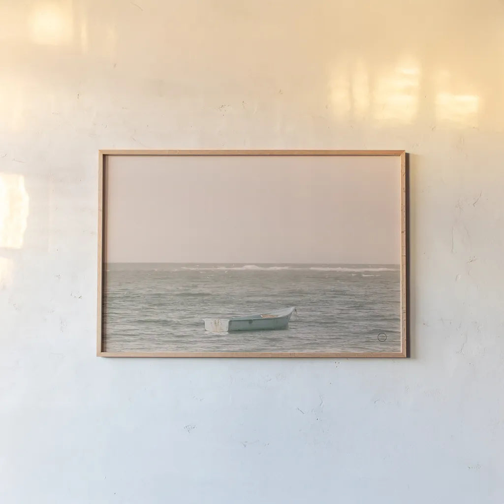 Fishing Boat by Nathan Larson. shown as a paper print in a natural frame. Available as a archival giclee rolled canvas, fine art paper, or poster print. SKU 72055i.