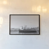 Fishing Boat Rest BW by Nathan Larson. shown as a paper print in a black flame. Available as a archival giclee rolled canvas, fine art paper, or poster print. SKU 103183i.