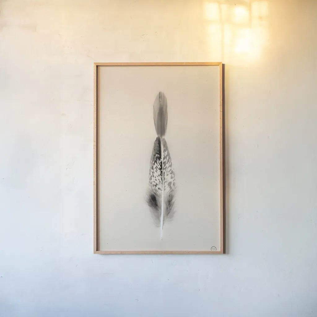 Floating Feathers I Sepia by Nathan Larson. shown as a paper print in a natural frame. Available as a archival giclee rolled canvas, fine art paper, or poster print. SKU 74146h.