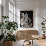 Flower Dreams BW I by Nathan Larson. shown as a print in a natural wood frame in a dining room. Available as a archival giclee rolled canvas, fine art paper, or poster print. SKU 103191h.