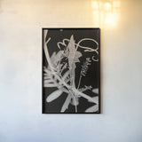 Flower Dreams BW II by Nathan Larson. shown as a paper print in a black flame. Available as a archival giclee rolled canvas, fine art paper, or poster print. SKU 103192h.
