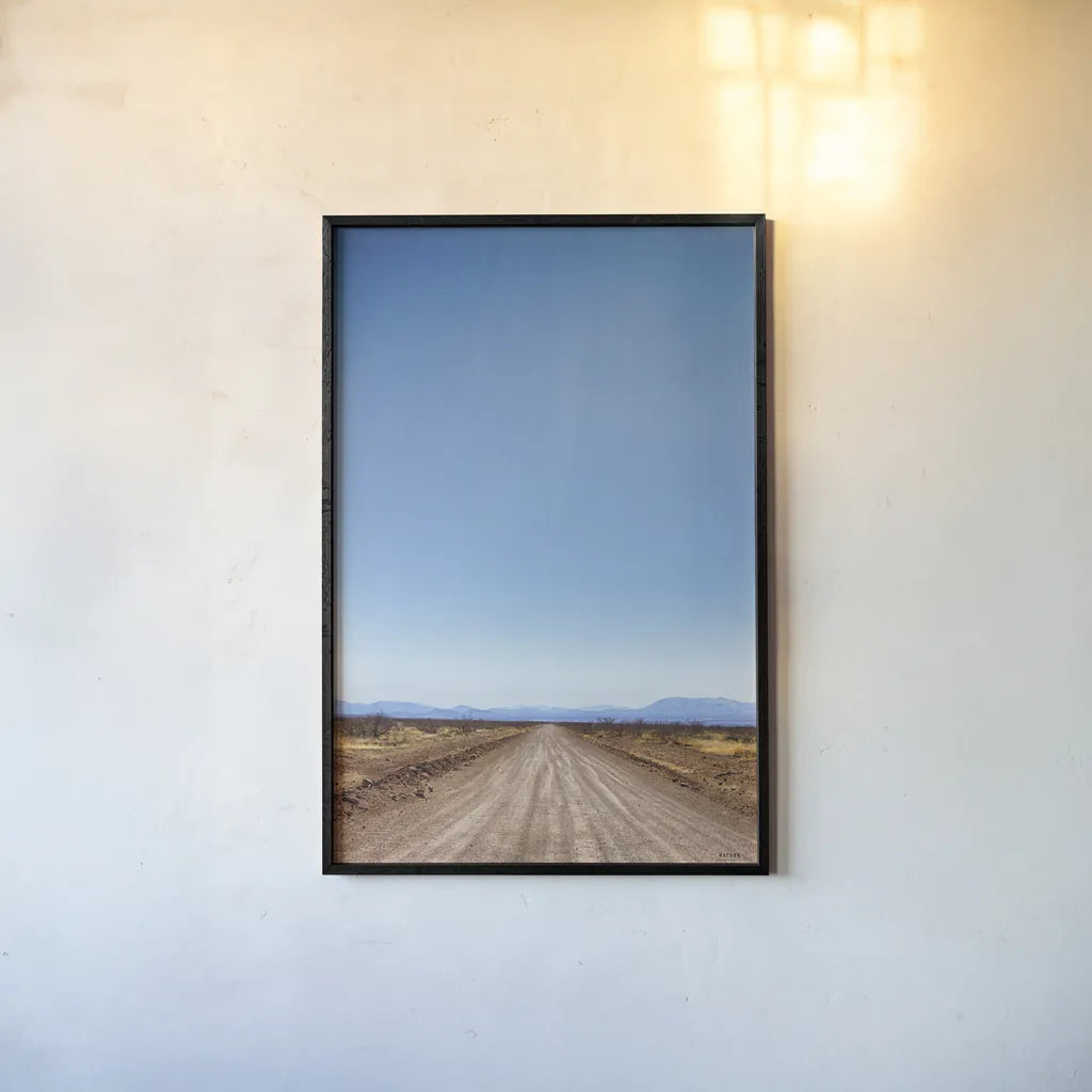 Follow Your Road by Nathan Larson. shown as a paper print in a black flame. Available as a archival giclee rolled canvas, fine art paper, or poster print. SKU 77275h.