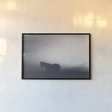 Following Along Twilight by Nathan Larson. shown as a paper print in a black flame. Available as a archival giclee rolled canvas, fine art paper, or poster print. SKU 104270i.