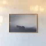 Following Along Twilight by Nathan Larson. shown as a paper print in a natural frame. Available as a archival giclee rolled canvas, fine art paper, or poster print. SKU 104270i.