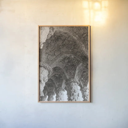 Gaudi Vaults I by Nathan Larson. shown as a paper print in a natural frame. Available as a archival giclee rolled canvas, fine art paper, or poster print. SKU 87718h.
