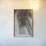 Gaudi Vaults II by Nathan Larson. shown as a paper print in a natural frame. Available as a archival giclee rolled canvas, fine art paper, or poster print. SKU 87719h.