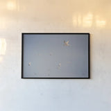 Georgia Seagulls II by Nathan Larson. shown as a paper print in a black flame. Available as a archival giclee rolled canvas, fine art paper, or poster print. SKU 85271i.