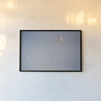 Georgia Seagulls II by Nathan Larson. shown as a paper print in a black flame. Available as a archival giclee rolled canvas, fine art paper, or poster print. SKU 85271i.