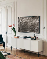 Georgia Stroll by Nathan Larson. shown as a framed stretched canvas in a living room above a console. Available as a archival giclee rolled canvas, fine art paper, or poster print. SKU 97581i.