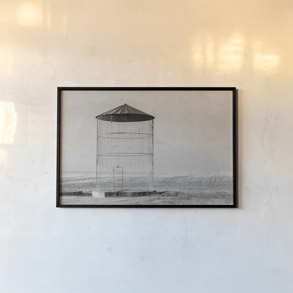 Ghost Silo by Nathan Larson. shown as a paper print in a black flame. Available as a archival giclee rolled canvas, fine art paper, or poster print. SKU 98343i.