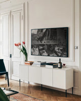 Ghost Town by Nathan Larson. shown as a framed stretched canvas in a living room above a console. Available as a archival giclee rolled canvas, fine art paper, or poster print. SKU 99380i.