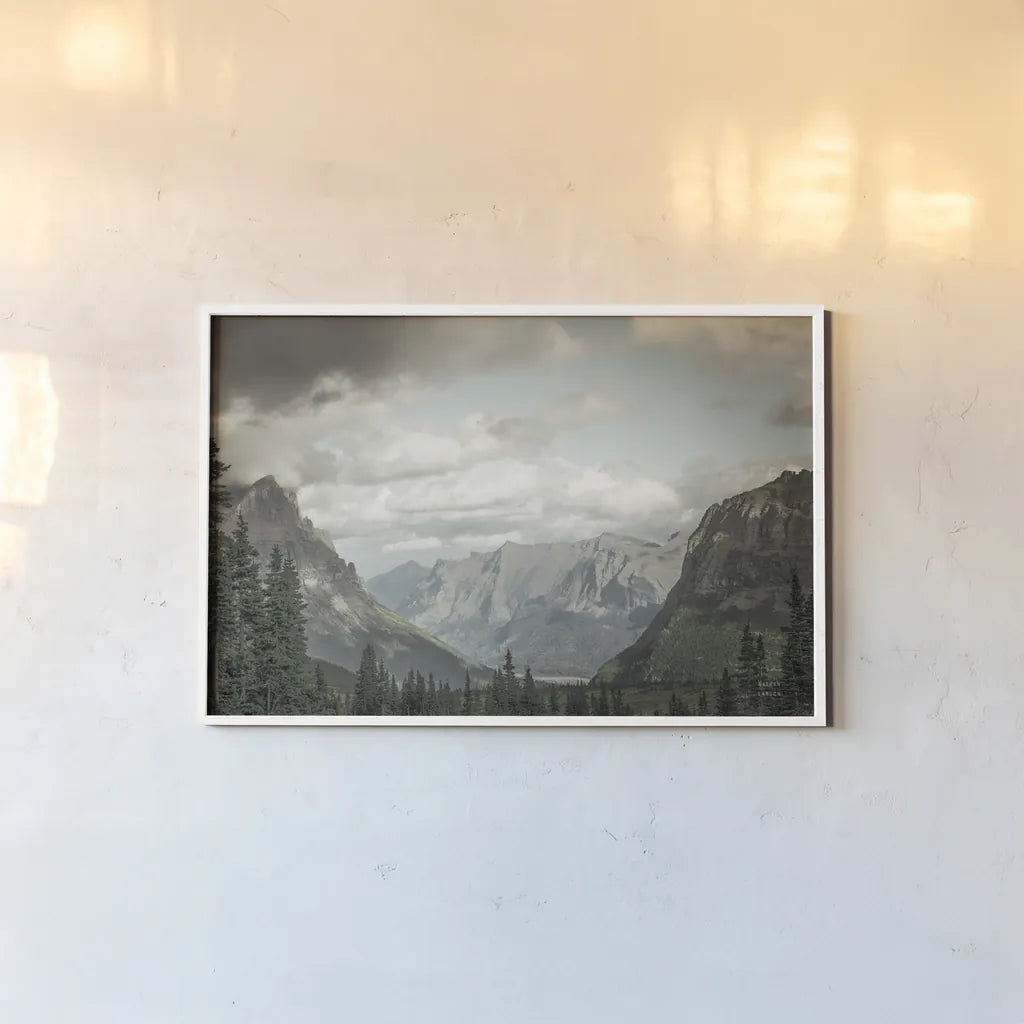 Glacier National Park Gateway by Nathan Larson. shown as a paper print in a white frame. Available as a archival giclee rolled canvas, fine art paper, or poster print. SKU 87646i.