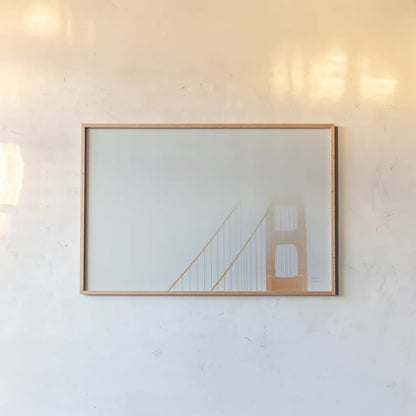 Golden Gate Fog Bright by Nathan Larson. shown as a paper print in a natural frame. Available as a archival giclee rolled canvas, fine art paper, or poster print. SKU 87946i.