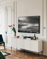 Golden Gate Rays by Nathan Larson. shown as a framed stretched canvas in a living room above a console. Available as a archival giclee rolled canvas, fine art paper, or poster print. SKU 86713i.