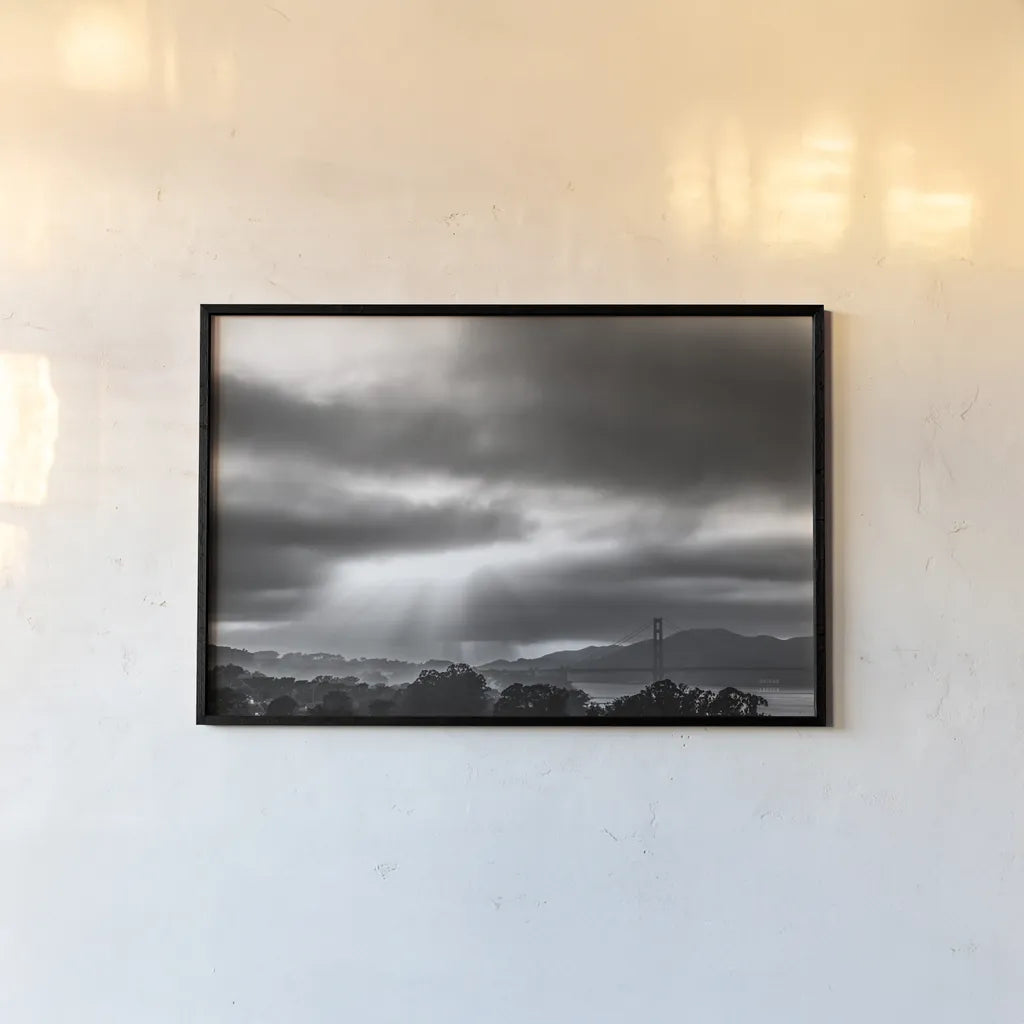 Golden Gate Rays by Nathan Larson. shown as a paper print in a black flame. Available as a archival giclee rolled canvas, fine art paper, or poster print. SKU 86713i.