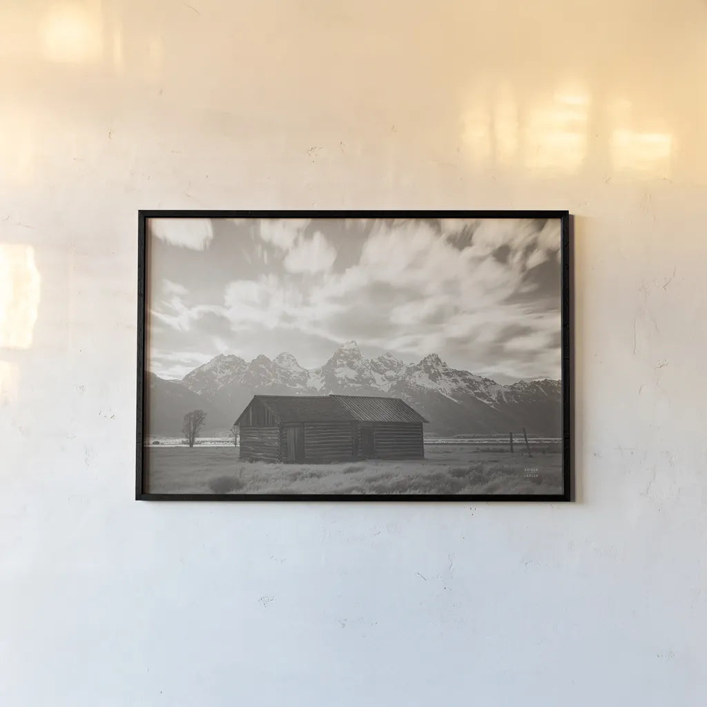 Grand Teton Settlers by Nathan Larson. shown as a paper print in a black flame. Available as a archival giclee rolled canvas, fine art paper, or poster print. SKU 92473i.